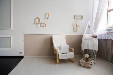 Interior of a nursery with a crib for a baby