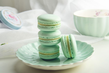 Turquoise mint macarons. French delicate dessert for Breakfast