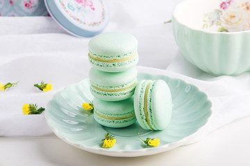 Turquoise mint macarons. French delicate dessert for Breakfast