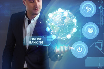 Business, Technology, Internet and network concept. Young businessman working on a virtual screen of the future and sees the inscription: Online banking