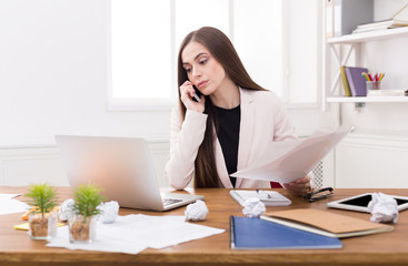 Business talk, woman consulting by phone at office