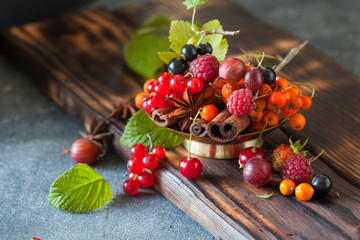 Assorted summer and autumn berries with spices