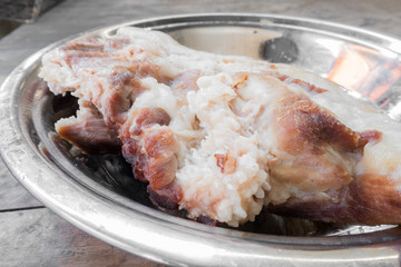 boil pork in steam pot, selective focus;