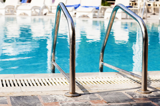 Handrail for entrance to the swimming pool © BGStock72