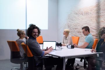 Startup Business Team At A Meeting at modern night office building