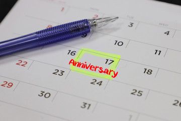 highlighter with a circled anniversary day on calendar