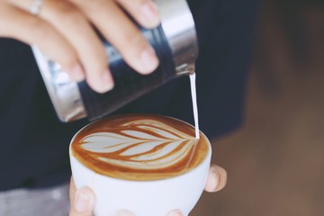 Fototapeta na wymiar coffee latte art by coffee master.