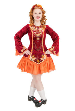 Beautiful woman in red dress for Irish dance isolated