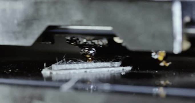 Three dimensional printer during work in school laboratory, 3D plastic printer, 3D printing