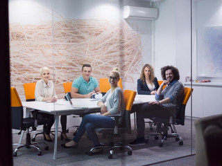 Startup Business Team At A Meeting at modern night office building