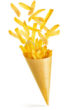 fries spilling out a paper cone isolated on white