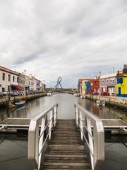 Fototapeta na wymiar Aveiro, Portugal - Circa September 2013: A view of the canals in Aveiro, Portugal