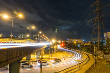 Fototapeta na wymiar light trail of traffic with night sky