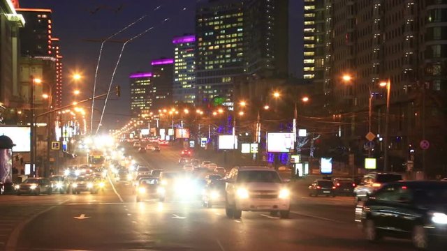 New Arbat Street, highway with moving cars at the night in Moscow, Russia