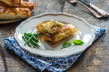 Salmon and basil butter filo parcels