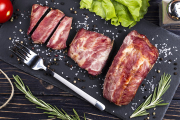 Grilled pork spare ribs on a board