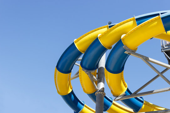 Part of the water park - a water slide element of blue and yellow