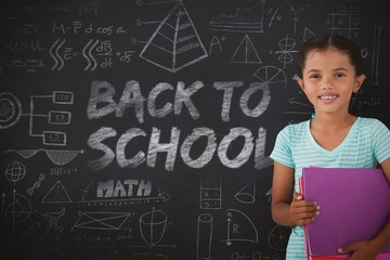 Composite image of portrait of smiling girl holding files