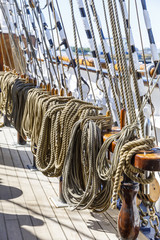 Obraz premium Many thick ropes bend together on a ship