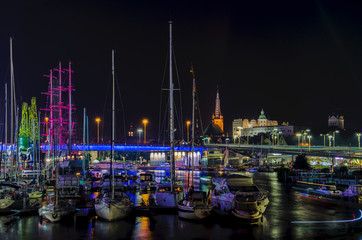 MARINA AT NIGHT - Yachts and sailing ship Mir moored at the wharf of the marina in Szczecin