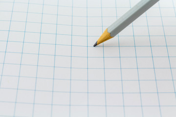 Pencil on paper drawing book with squares