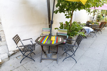 Outdoor cafe with a colorful table