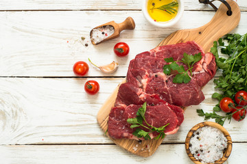 Beef steak with ingredients. Raw cooking ingredients.