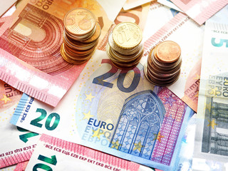 Euro banknotes as a background, a lot of cash, coins, concept, economy growth, currency, crypto currency, new technology