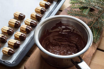 Christmas cookies with a pot of chocolate