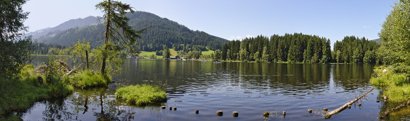 Fototapeta na wymiar Black lake in a moor area