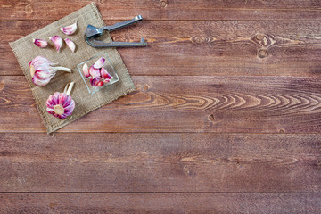 Garlic. Garlic Cloves and Garlic Bulb on a wooden vintage rustic table. Top View. Copy Space