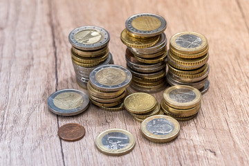 euro coins in a pile at table. close up