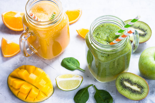 Green and yellow smoothie in mason jar