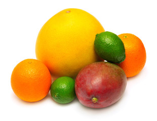 Assorted tropical fruit lime, pomelo, mango and lime isolated on white background. A healthy and nutritious food for health after training in sports for burning fat. Flat lay, top view