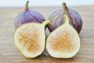 Delicious fresh figs on a wood view