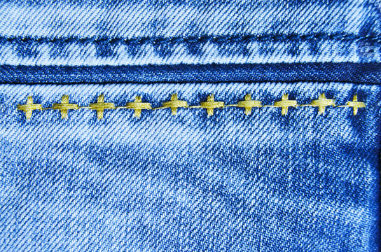 Blue Jeans Cloth With Seam Background Texture Vignette.