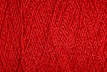 красная текстура из мотка толстых шерстяных ниток 