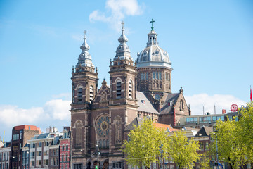 Obraz premium City view of the Basilica of Saint Nicholas Church - Sint-Nicolaasbasiliek. Amsterdam, Netherlands