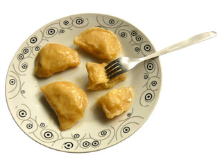 Pierogi On Plate With Fork Isolated