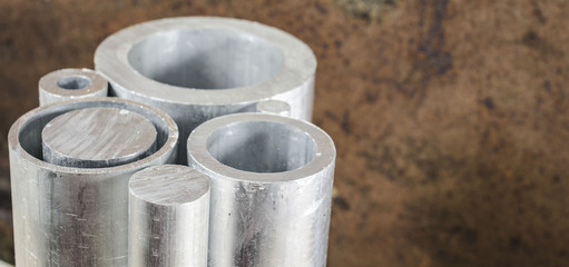 Metal pipelines profile on rusty background