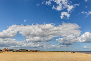 Fototapeta na wymiar Beautiful sunny day on a beach on the Norfolk coast, England