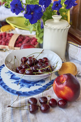 Cherry and other fruits in the background