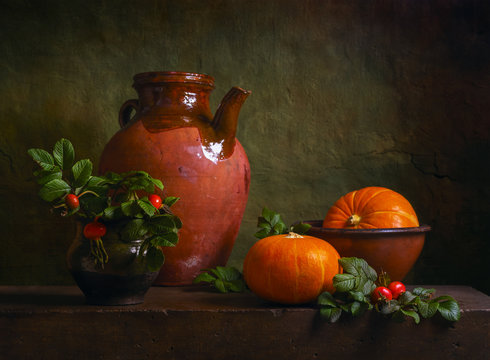 Still life with pumpkins and briars