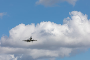 Fototapeta na wymiar Twin engine passenger aircraft approaching for landing