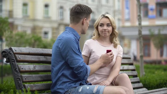 Guy proposing with ring to girlfriend, girl refusing to marry, disappointment
