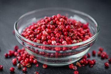 Portion of Pink Peppercorns on a slate slab