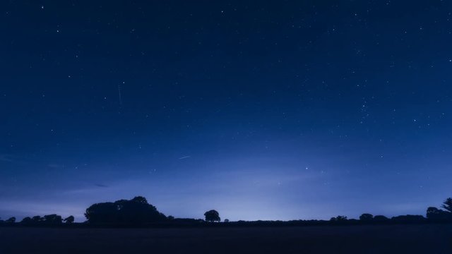 night time star trails silhouette landscape