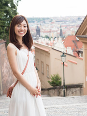 portrait of young asian woman traveling in europe