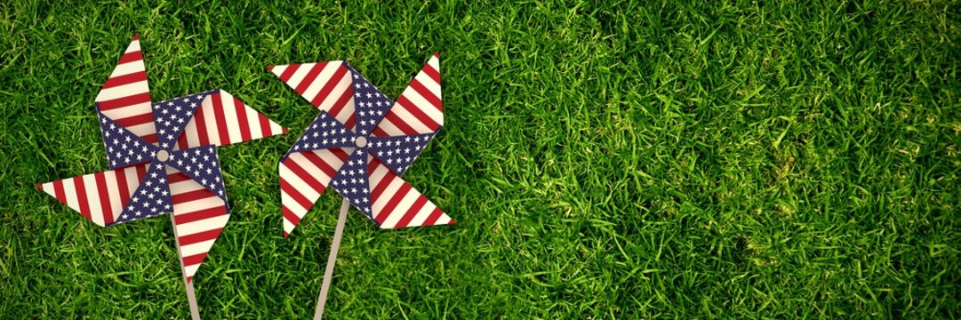 Composite image of 3d image composite of pinwheel with american 