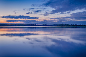 Fototapeta premium Scenic Destinations and Travel Concepts. Belarussian National Park Braslav Lakes at Sunset during Summertime.